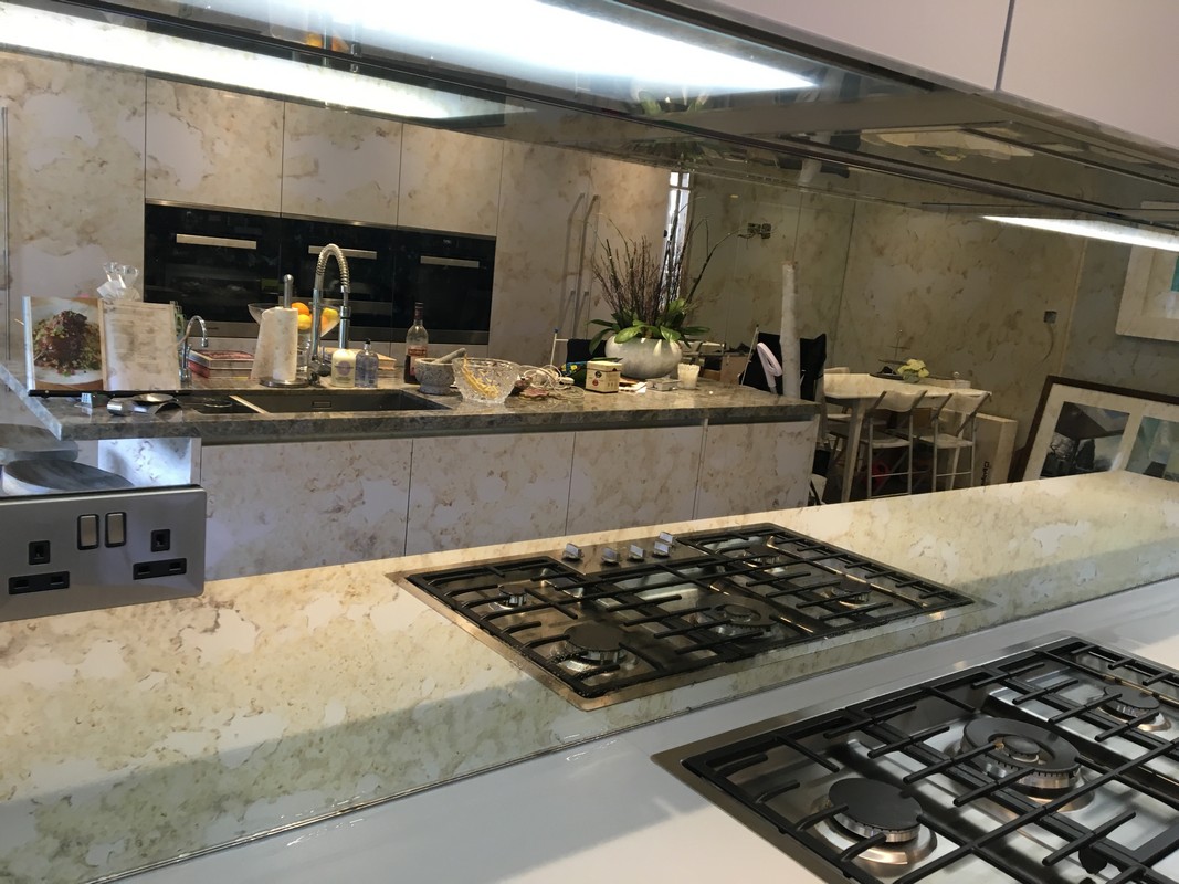 Mirror glass splashback in Stockwell luxury kitchen
