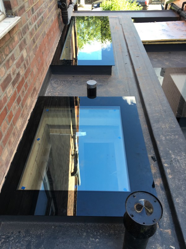 Multiple flat roof skylights on extension in Stockwell